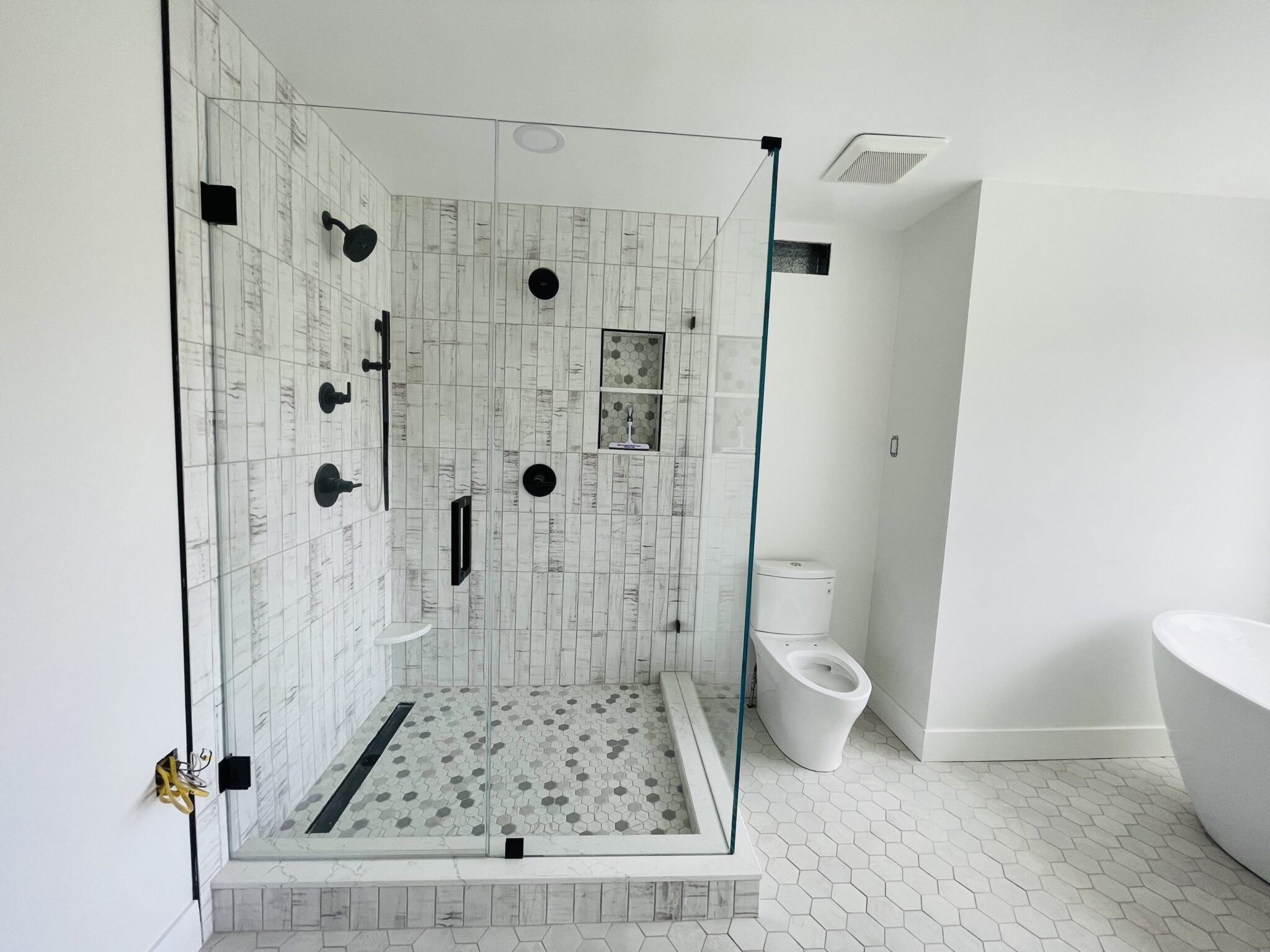 Fixing A Glass Shower Door That Doesn’t Slide Smoothly M&N Frameless